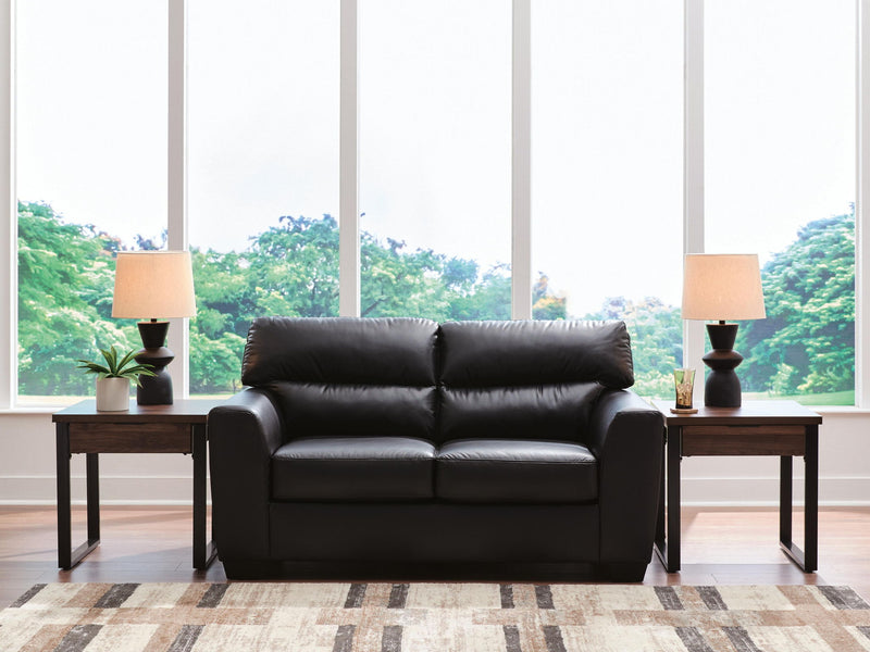 Midnight navy stationary loveseat from Signature Design by Ashley, featuring plush cushions and modern styling.