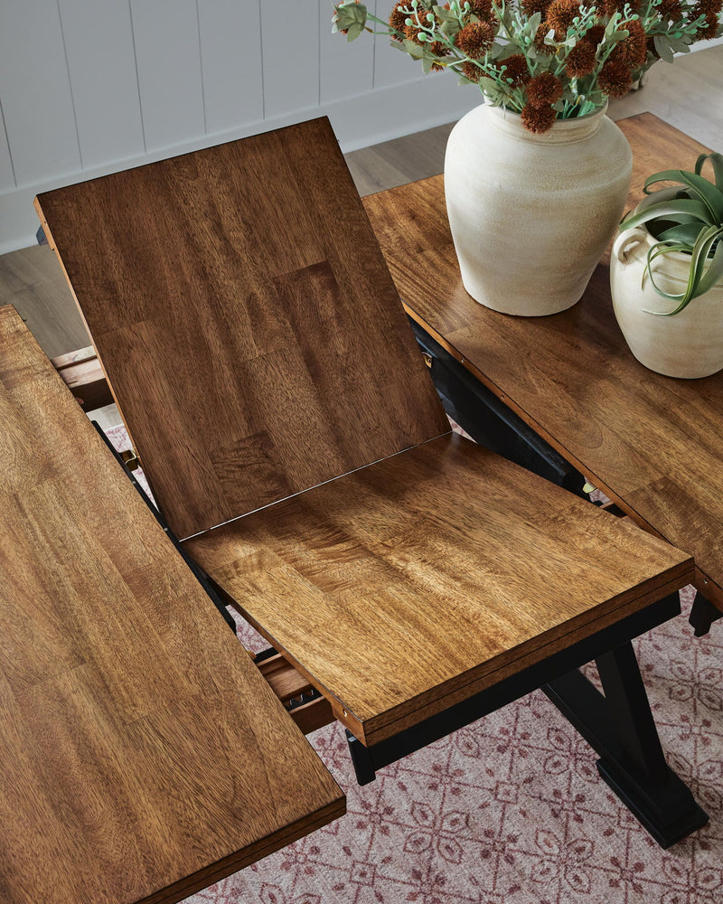 Signature Design by Ashley Wildenauer dining room extension table, counter height with wood finish and sturdy legs.