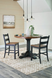 Signature Design by Ashley Valebeck counter height dining room set with four matching pieces, including table and chairs.