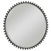 Round iron wall mirror with a sleek frame, designed by Uttermost for modern home decor.