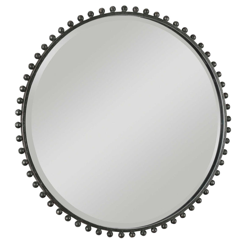 Round iron wall mirror with a sleek frame, designed by Uttermost for modern home decor.