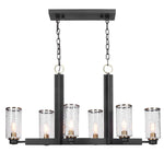 Uttermost Jarsdel 6-light black industrial island pendant light with cylindrical metal shades and chain suspension.