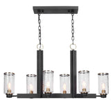 Uttermost Jarsdel 6-light black industrial island pendant light with cylindrical metal shades and chain suspension.