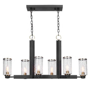Uttermost Jarsdel 6-light black industrial island pendant light with cylindrical metal shades and chain suspension.