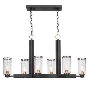 Uttermost Jarsdel 6-light black industrial island pendant light with cylindrical metal shades and chain suspension.