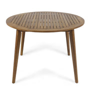 Noble House Stamford outdoor dining table with modern design, featuring a sleek rectangular wood surface and sturdy metal legs.