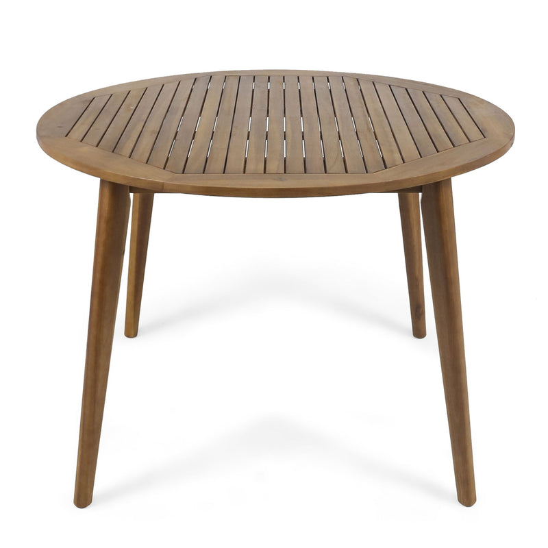 Noble House Stamford outdoor dining table with modern design, featuring a sleek rectangular wood surface and sturdy metal legs.