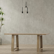 Simpli-Home Whitley dining table with a wooden surface and metal legs, ideal for modern dining rooms.