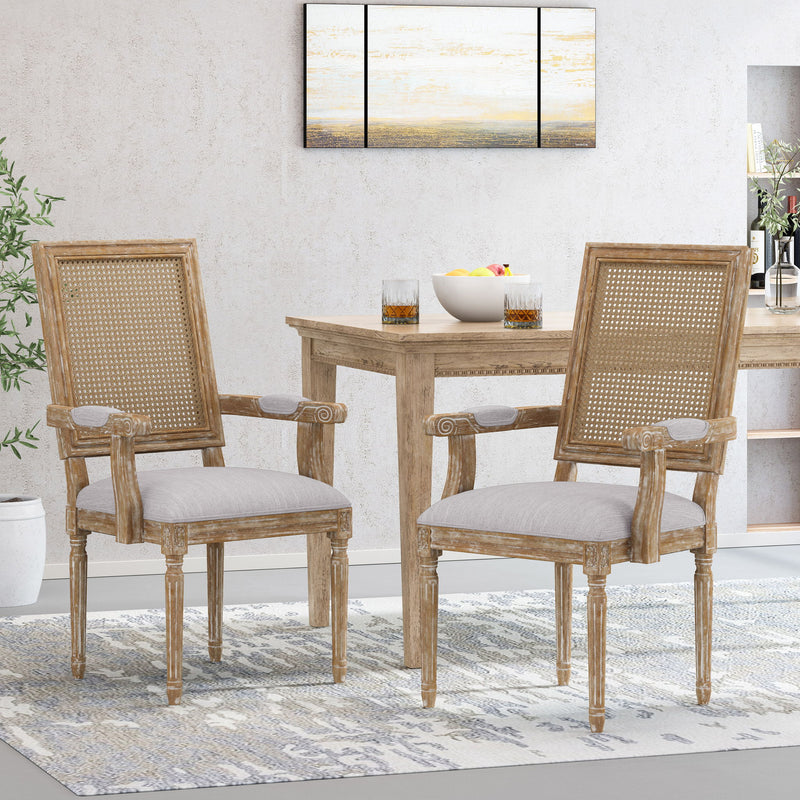 Elegant French country style arm dining chair with cane backrest by Noble House, showcasing a classic wooden frame and woven cane detail.