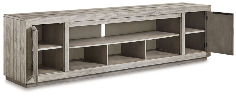 Naydell - XL TV Stand w/Fireplace Option - Gray - R&R Furniture Gallery (Fountain Valley, CA)