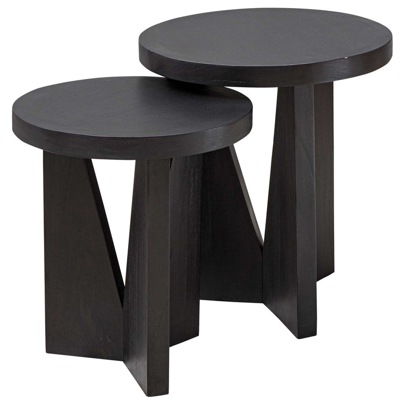 Pair of Uttermost Nadette nesting tables with sleek wood tops and black metal legs, perfect for modern living spaces.