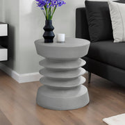 Contemporary round accent table by 8th Street, suitable for indoor or outdoor use, featuring a sleek modern design and smooth surface.