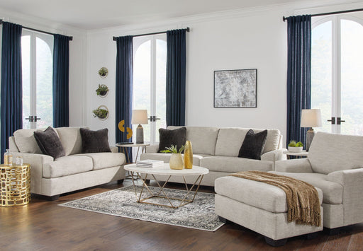 Signature Design by Ashley Vayda living room set with stationary chair and matching ottoman, showcasing modern upholstery and comfortable design.