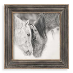Framed print of black and white horses on dark brown background by Uttermost, showcasing detailed horse artwork in a stylish frame.