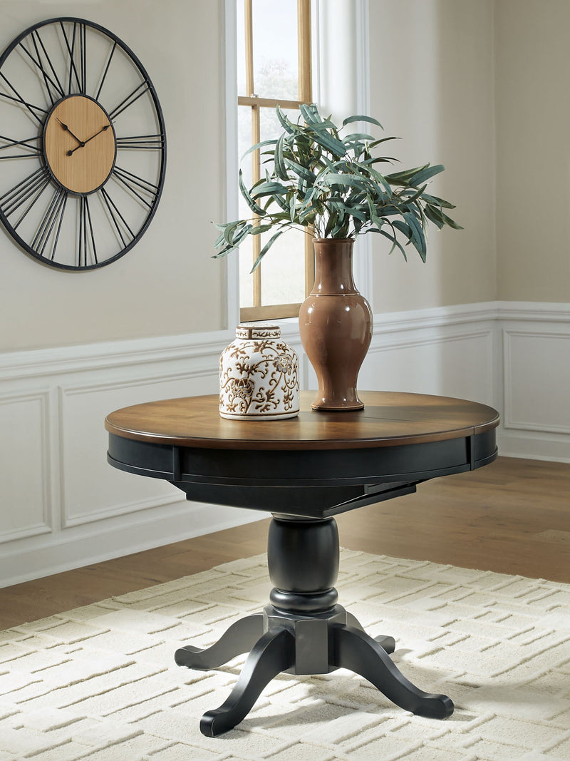 Clorazi - Oval Dining Room Butterfly Extension Table - Black / Brown - R&R Furniture Gallery (Fountain Valley, CA)