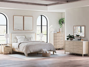 Signature Design by Ashley Cadmori six drawer dresser with sleek wood finish and modern hardware, featuring six spacious drawers.