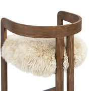 Jennifer Taylor Home Millwick low back counter stool with wooden legs and padded seat at a counter height of 24 to 27 inches.