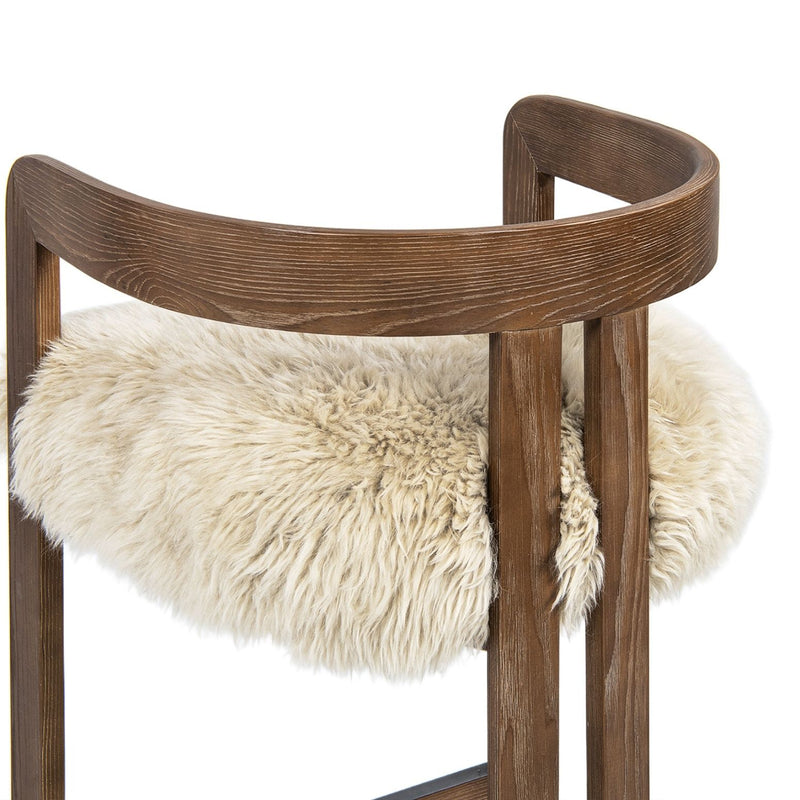 Jennifer Taylor Home Millwick low back counter stool with wooden legs and padded seat at a counter height of 24 to 27 inches.