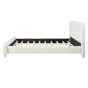 Artistry At Home upholstered platform bed frame with curved headboard and wood slats support, showcasing a modern bedroom setup.