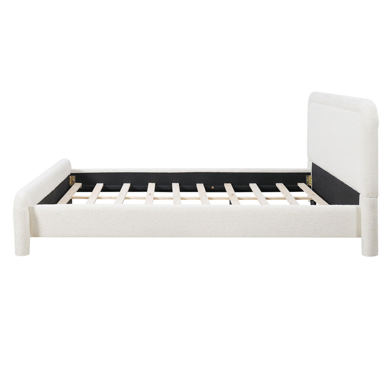 Artistry At Home upholstered platform bed frame with curved headboard and wood slats support, showcasing a modern bedroom setup.