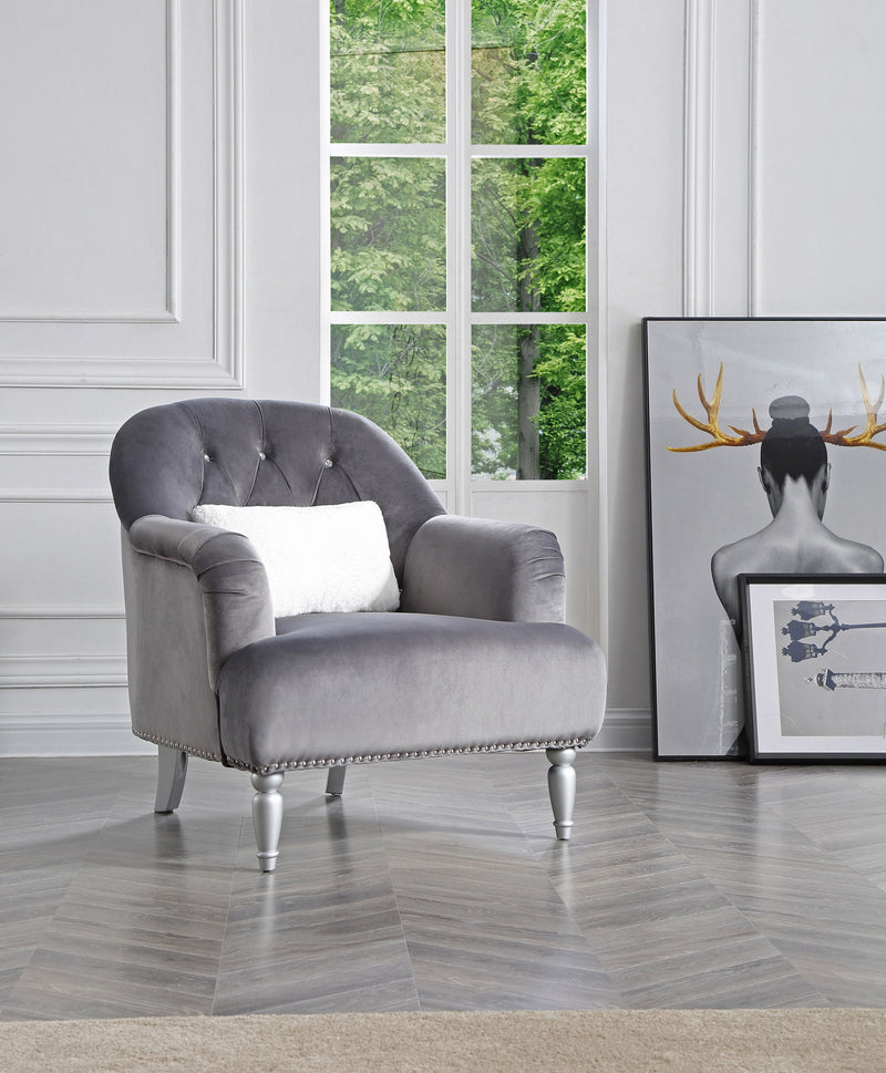 Elegant traditional armchair by Glory Furniture featuring plush upholstery and classic wooden legs, ideal for living room decor.