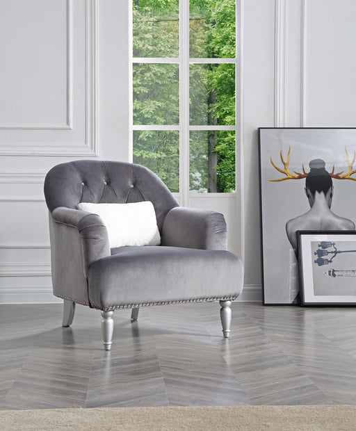 Elegant traditional armchair by Glory Furniture featuring plush upholstery and classic wooden legs, ideal for living room decor.