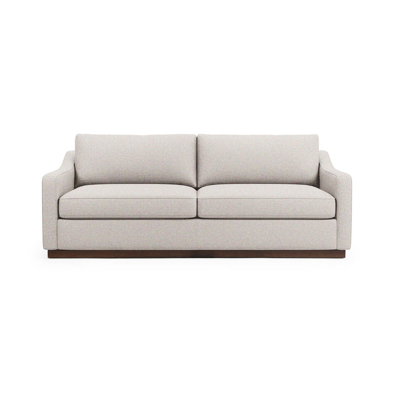 Classic Home Aspen stationary sofa with plush beige fabric, featuring cushioned arms and back for comfortable seating.