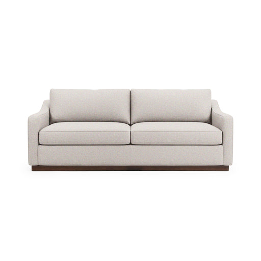 Classic Home Aspen stationary sofa with plush beige fabric, featuring cushioned arms and back for comfortable seating.