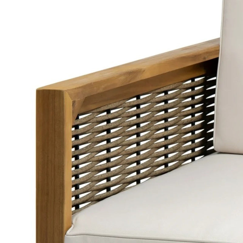 Outdoor 4 seater acacia wood chat set with wicker accents and beige cushions, ideal for garden or patio seating.