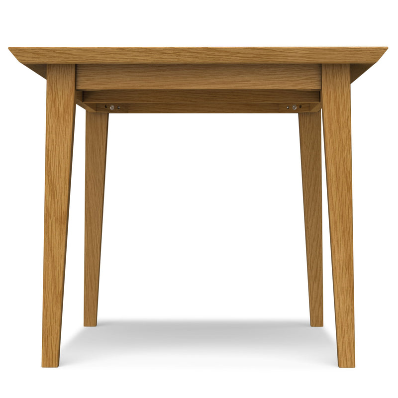 Contemporary Colby dining table by Simpli-Home with a sleek wooden surface and sturdy legs, ideal for modern dining rooms.