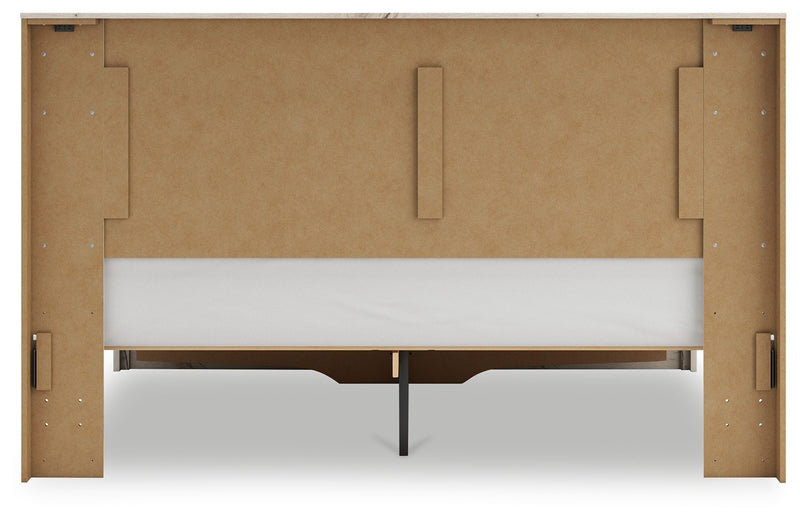 Signature Design by Ashley Lawroy panel storage bed with built-in drawers and a modern wooden finish in a bedroom setting.