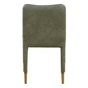 Pair of Uttermost Conifer dining chairs with wooden legs and upholstered seats, set of two for elegant dining room decor.