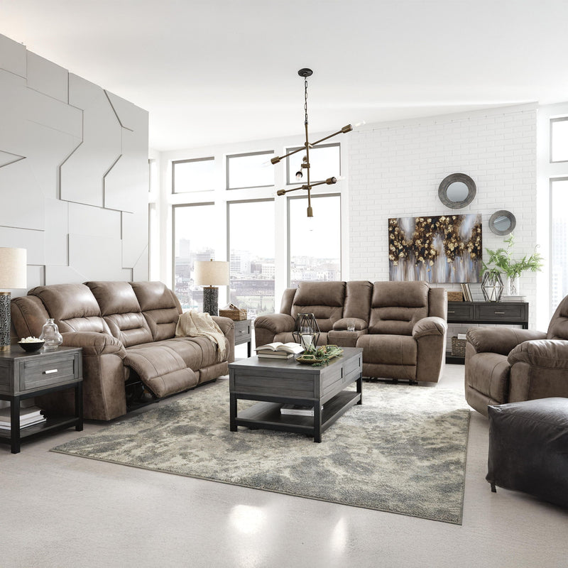 Signature Design by Ashley reclining sofa from Stoneland collection, featuring plush cushions and a comfortable reclined position.