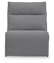 Signature Design by Ashley Modmax II reclining sectional in salt and pepper fabric, featuring plush cushions and a modern design.