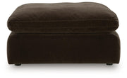 Benchcraft® Maxton Heights oversized accent ottoman with plush fabric and modern design, shown in a neutral color.