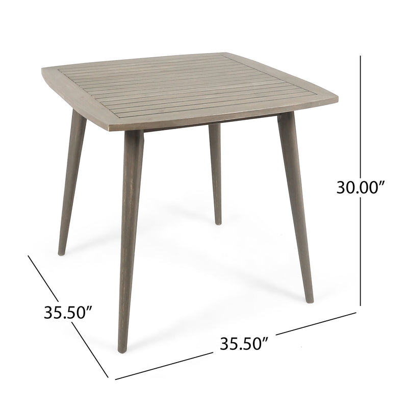 Modern indoor square dining table by Noble House featuring acacia wood and toothpick leg design for contemporary style.