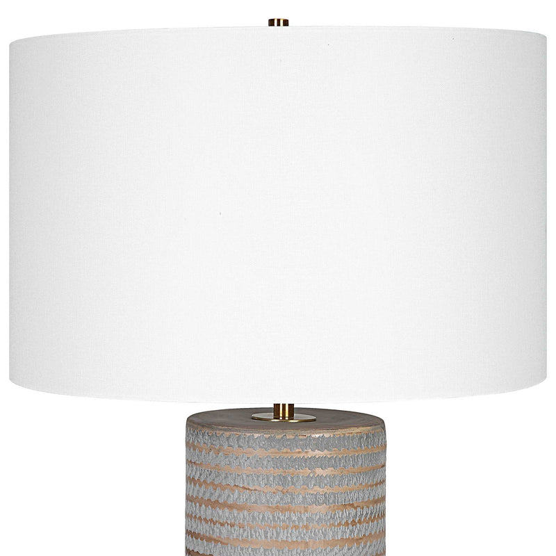 Uttermost Monolith gray table lamp with sleek modern design and cylindrical base, perfect for contemporary home decor.