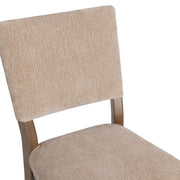 Pair of Classic Home Arima dining chairs set, featuring modern design with wooden legs and upholstered seats for kitchen or dining room