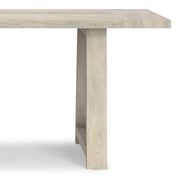 Simpli-Home Whitley dining table with wooden surface and sturdy legs, ideal for family meals and modern dining rooms.