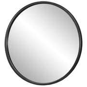 Uttermost Dawsyn black round accent mirror with a sleek, modern frame, hanging on a neutral wall.