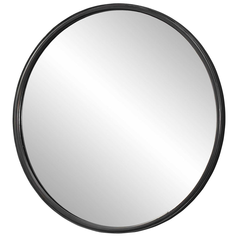 Uttermost Dawsyn black round accent mirror with a sleek, modern frame, hanging on a neutral wall.