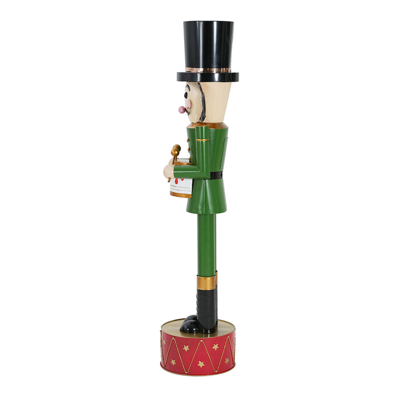 Noble House Christmas Nutcracker holiday decor in green and red, featuring a festive nutcracker figure for seasonal decoration.
