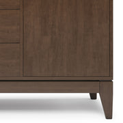 Simpli-Home Harper sideboard buffet with wood finish, featuring multiple storage cabinets and sleek modern design.