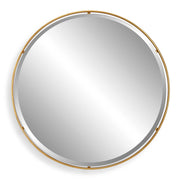 Round gold accent mirror by Uttermost with a sleek, modern frame, perfect for stylish interior decor.