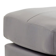 Upholstered casual ottoman by Glory Furniture with stylish fabric cover, perfect for modern living room or lounge space.