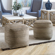 Uttermost Shiro beige accent pouf with soft fabric upholstery, versatile interior decor piece, round and cushioned.
