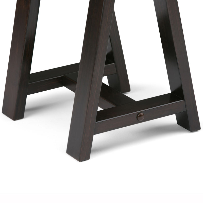 Handcrafted Simpli-Home console sofa table with sawhorse-style legs, made of wood for a rustic, stylish living room accent.
