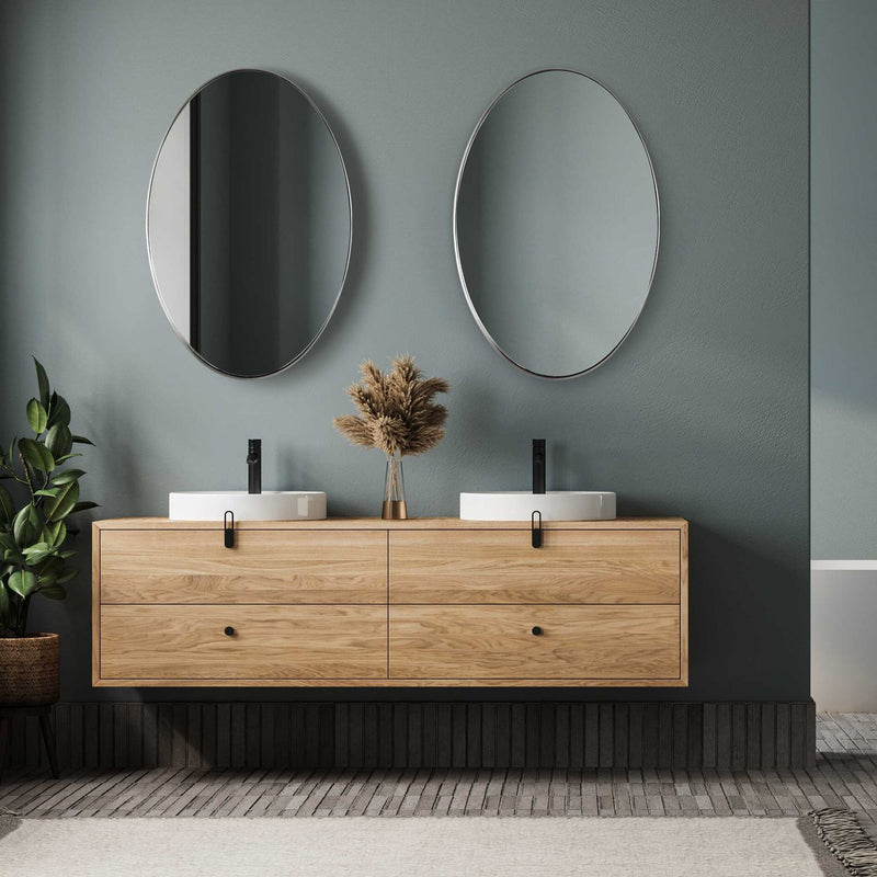Uttermost Pursley oval wall mirror with brushed nickel finish, featuring a sleek, modern design for contemporary home decor.