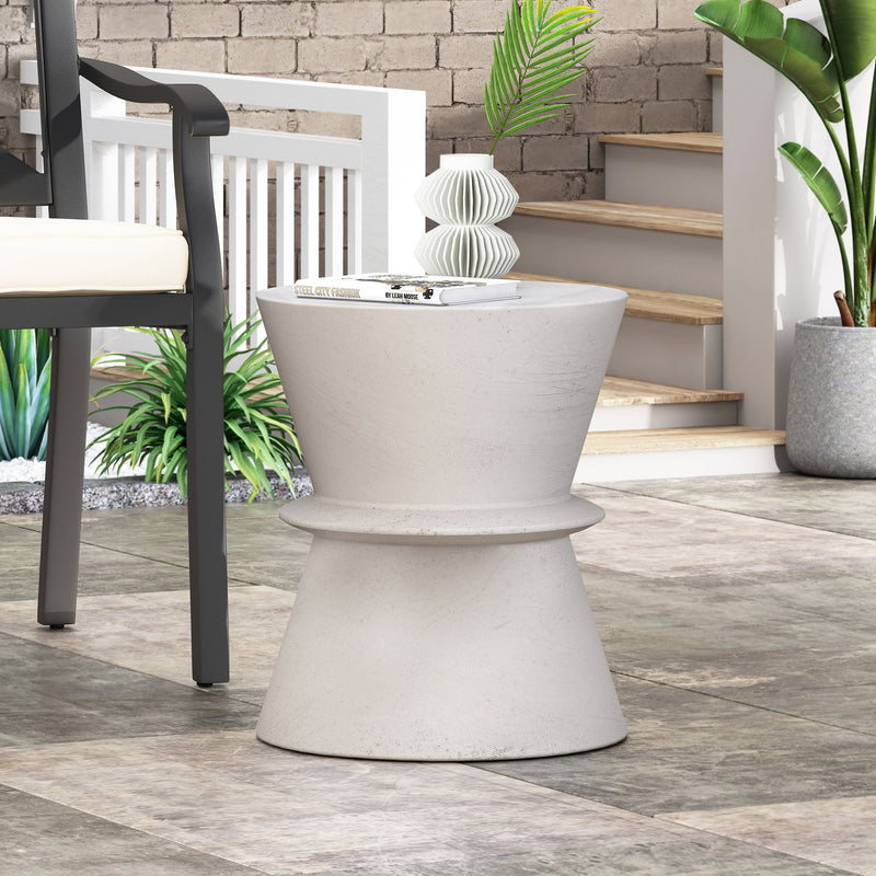 Outdoor lightweight concrete end table with hourglass shape in antique white, featuring a sleek and modern design by Noble House.