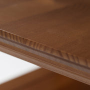 Handcrafted Acadian end table by Simpli-Home featuring a rustic wooden surface and sturdy legs for living room decor.